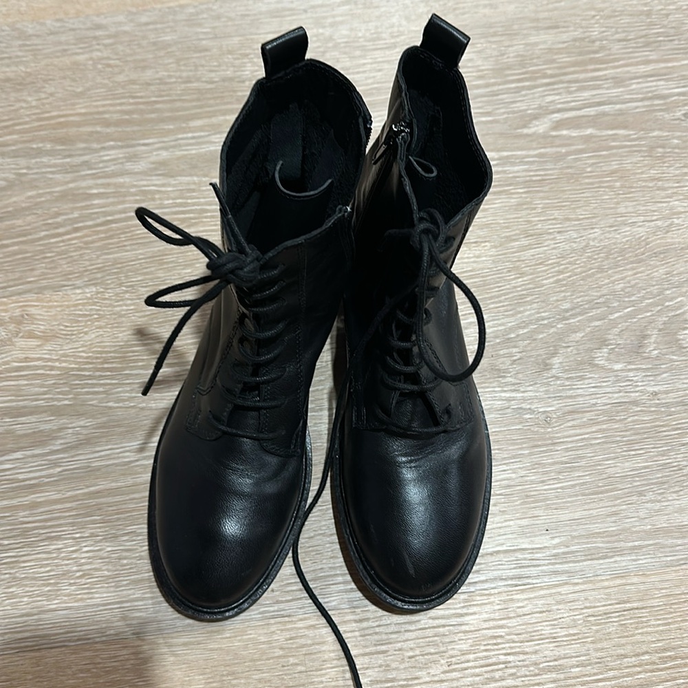 Zara combat boots. Rugged and elegant at same time with faux leather laces.